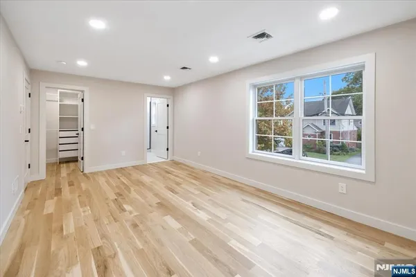 a view of empty room with windows