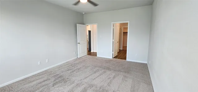 a view of a room with a hallway