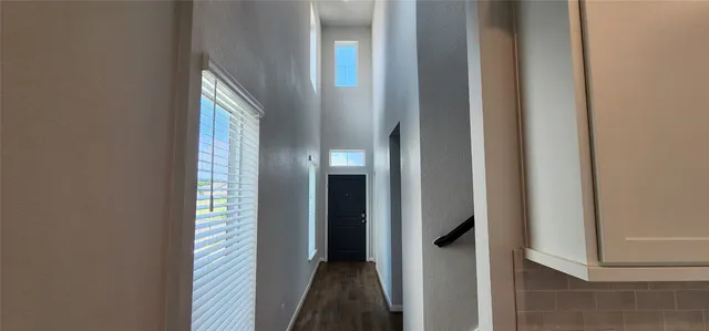 a view of a bathroom from the hallway
