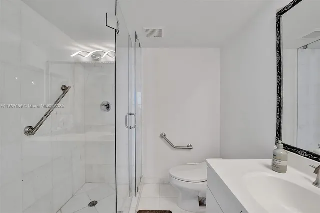 a bed room with a bed and a couch