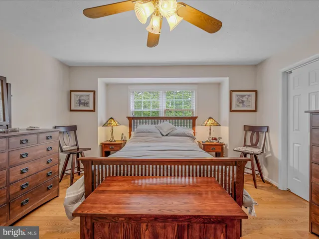 a bathroom with a shower curtain and a sink