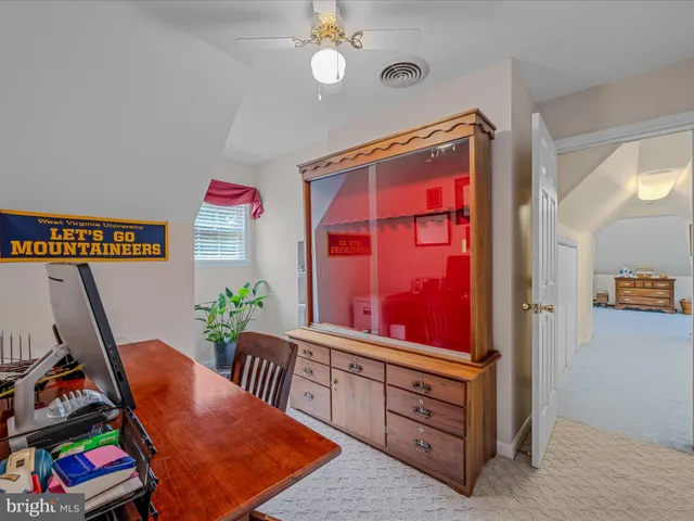 a view of an empty room with storage