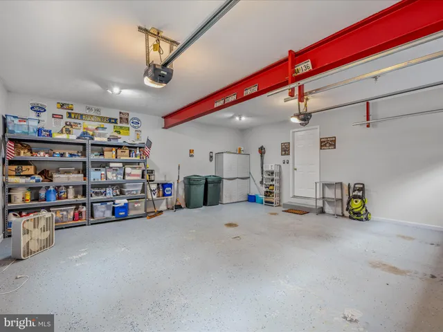 a view of a house with wooden deck