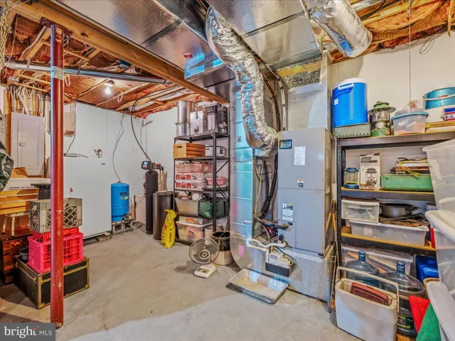 a view of a field with trees in front of it