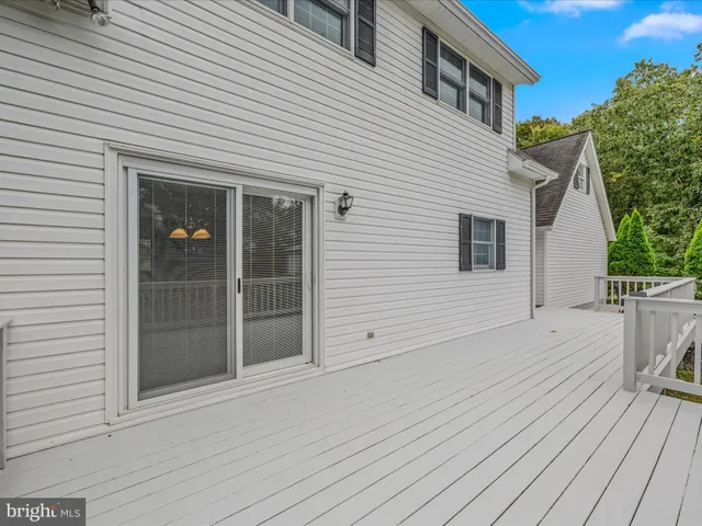 a house with trees in front of it