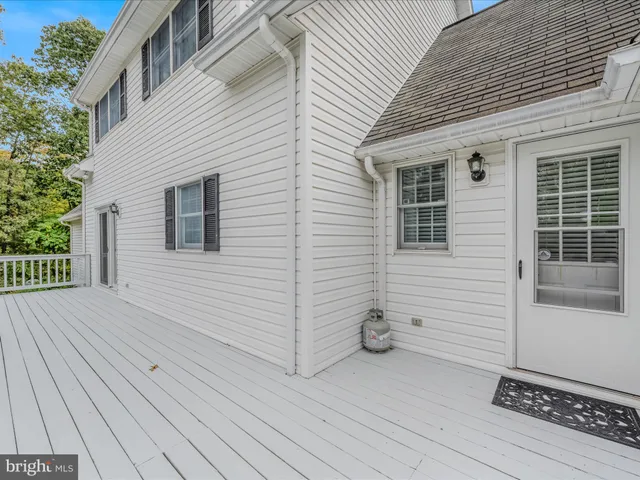 a view of outdoor space with garden and trees
