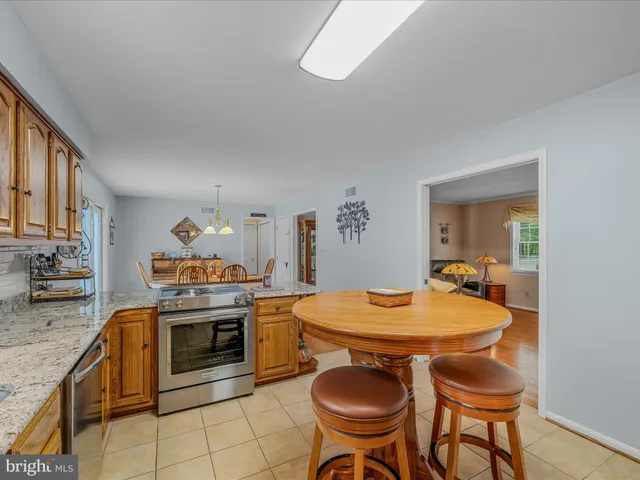 a dining room table with chairs