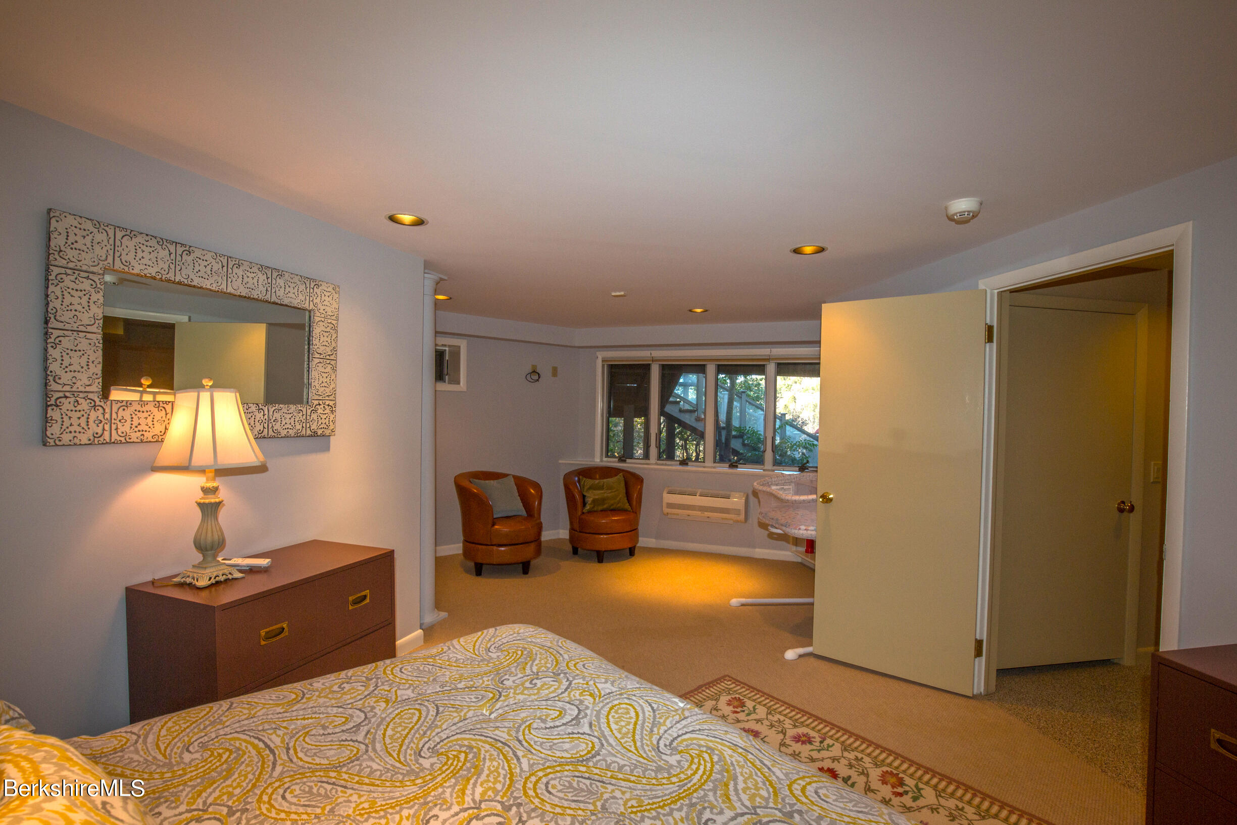 6 Bidwell Road Monterey, MA 01245 - Photo 39 of 53 a bedroom with a bed and wooden floor