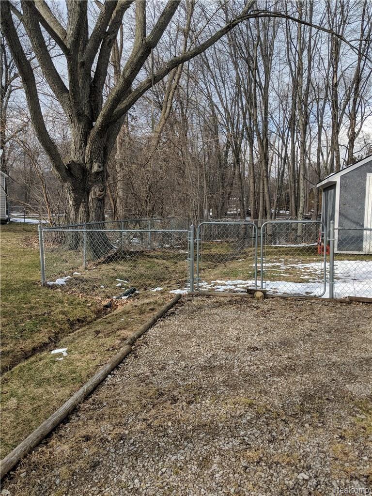 4222 Crocus Road Waterford, MI 48328 - Photo 30 of 31 DOUBLE GATED ENTRY TO BACK YARD/SHED