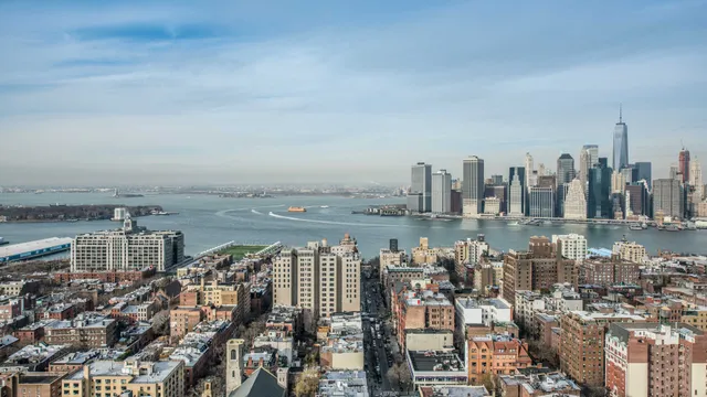 a view of a city and ocean