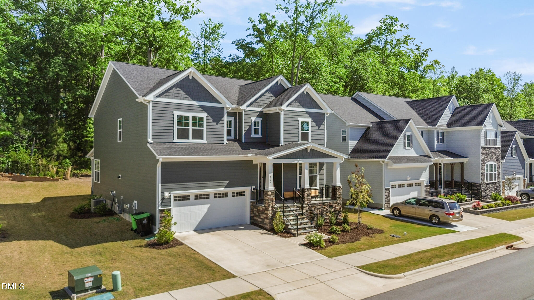 2966 Rise And Shine Road Apex, NC 27502 - Photo 3 of 61 a front view of a house with sitting area and garden