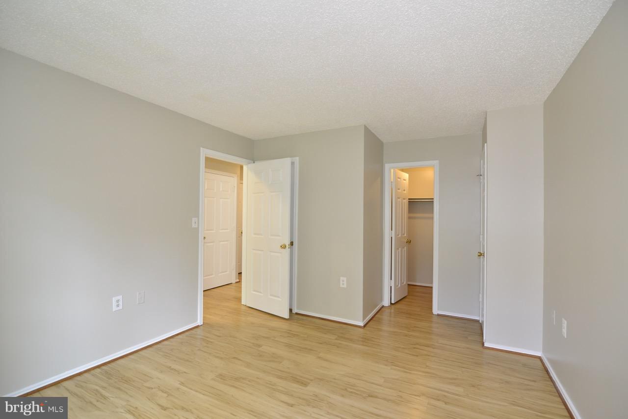 20950 Timber Ridge Terrace, Unit 103 Ashburn, VA 20147 - Photo 21 of 30 Bedroom