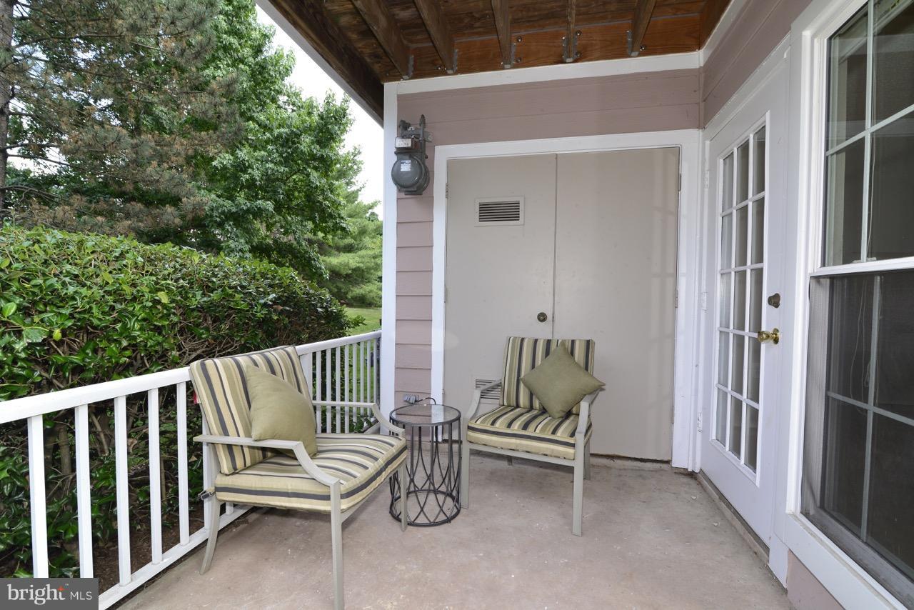 20950 Timber Ridge Terrace, Unit 103 Ashburn, VA 20147 - Photo 25 of 30 Exterior (Rear)