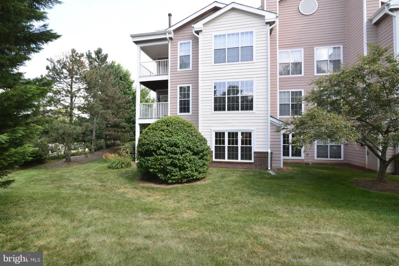 20950 Timber Ridge Terrace, Unit 103 Ashburn, VA 20147 - Photo 28 of 30 Exterior (Rear)
