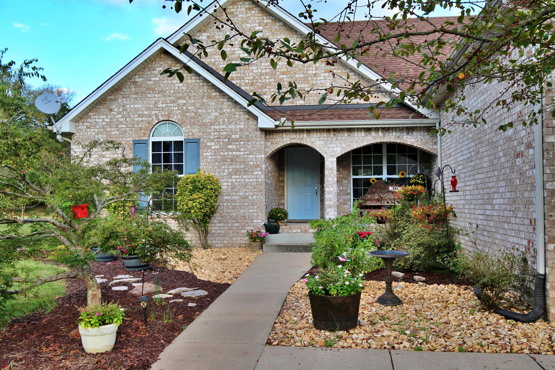 592 Windy Road Mount Juliet, TN 37122 - Photo 1 of 24 a front view of a house with a porch