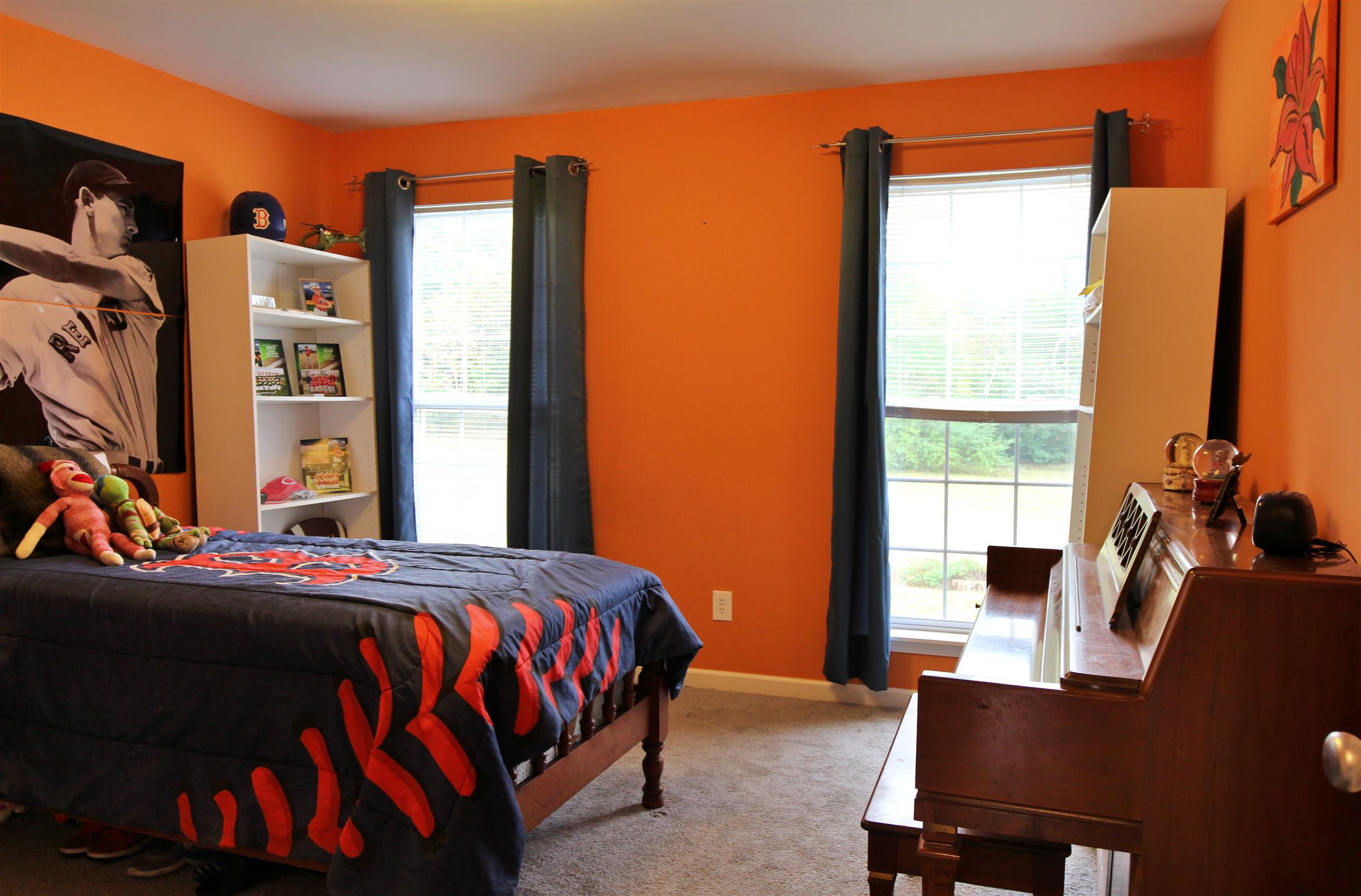 592 Windy Road Mount Juliet, TN 37122 - Photo 16 of 24 a bedroom with a bed and a window