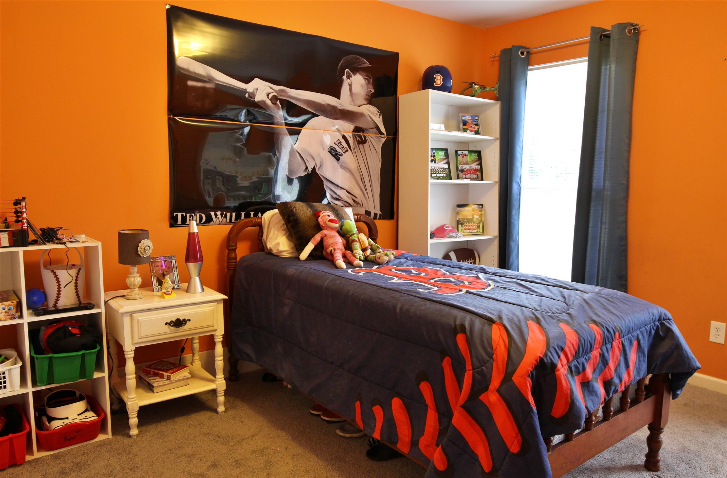 592 Windy Road Mount Juliet, TN 37122 - Photo 17 of 24 a bed room with a bed and a closet