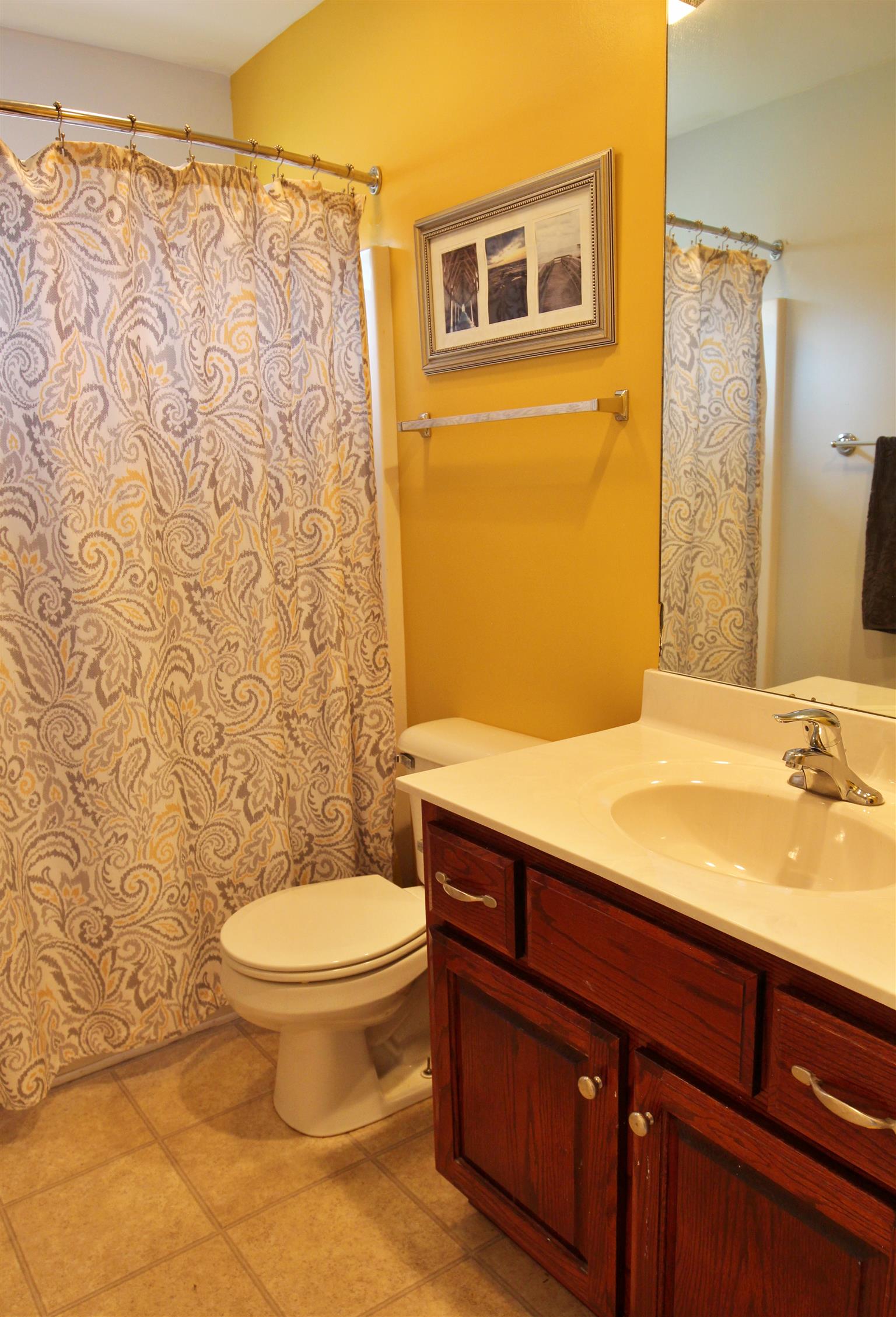 592 Windy Road Mount Juliet, TN 37122 - Photo 19 of 24 a bathroom with a granite countertop toilet and a sink