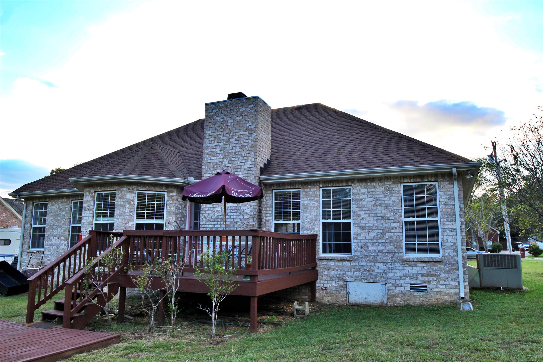 592 Windy Road Mount Juliet, TN 37122 - Photo 23 of 24 a view of a deck with a table and chairs
