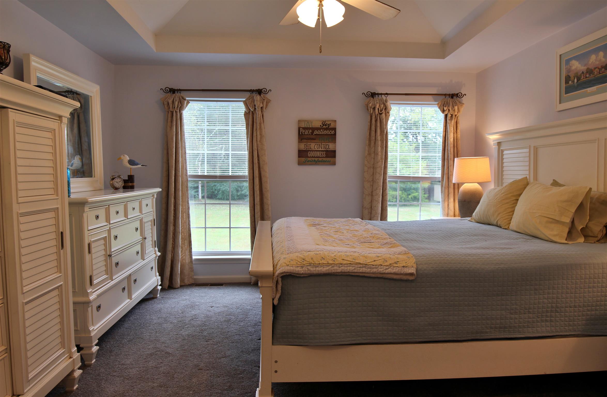 592 Windy Road Mount Juliet, TN 37122 - Photo 5 of 24 a bedroom with a bed and a window