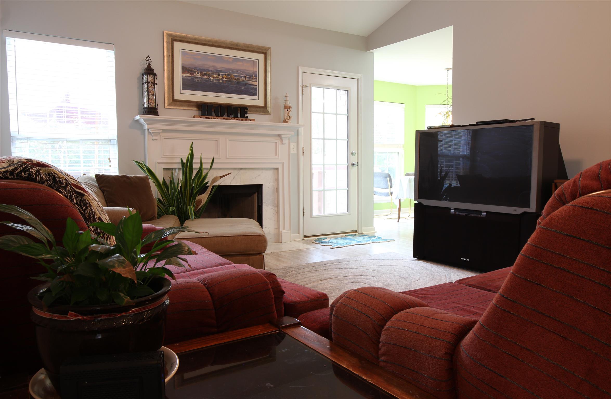 592 Windy Road Mount Juliet, TN 37122 - Photo 9 of 24 a living room with furniture and a flat screen tv