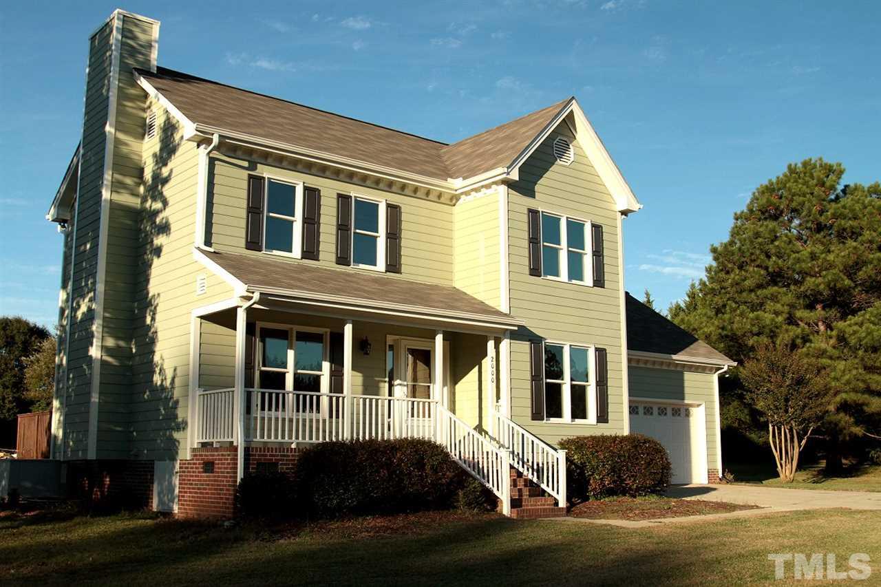 2000 Stoneglen Lane Raleigh, NC 27603 - Photo 2 of 25 a front view of a house with a yard