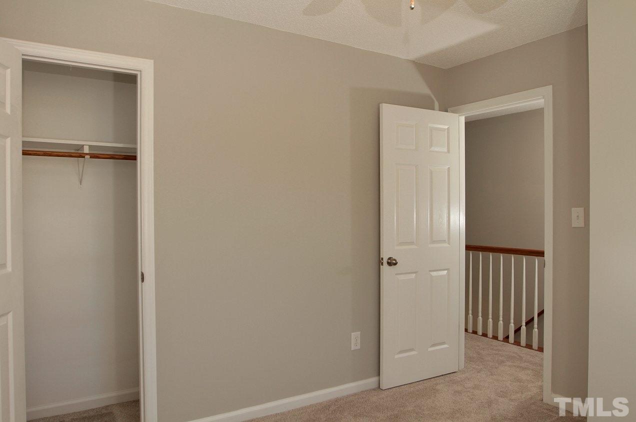 2000 Stoneglen Lane Raleigh, NC 27603 - Photo 23 of 25 a view of a hallway with closet area