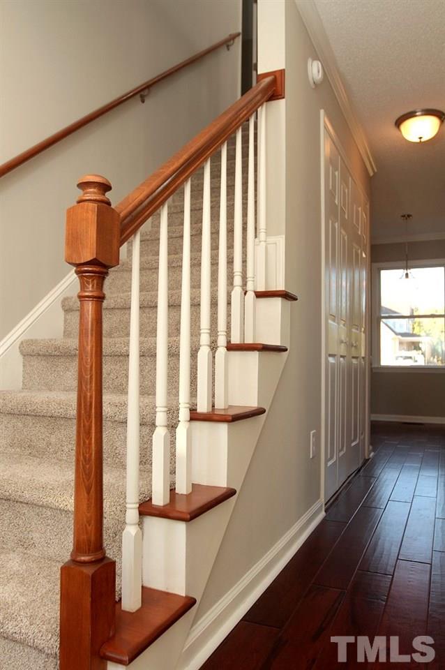 2000 Stoneglen Lane Raleigh, NC 27603 - Photo 4 of 25 a view of entryway with wooden floor