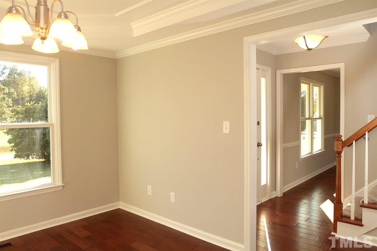 2000 Stoneglen Lane Raleigh, NC 27603 - Photo 5 of 25 a view of entryway with wooden floor