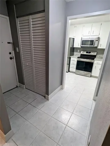 a view of room with window and outdoor space