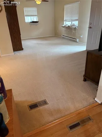 a living room with furniture and a couch