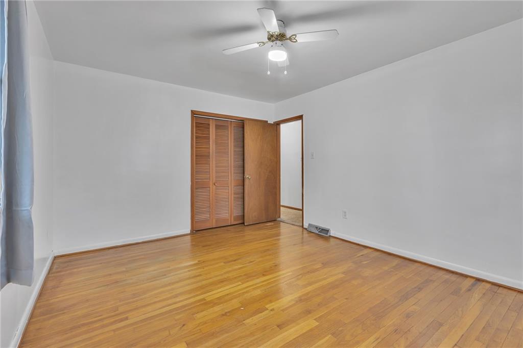 101 2nd Street Midland, PA 15059 - Photo 11 of 37 wooden floor in an empty room