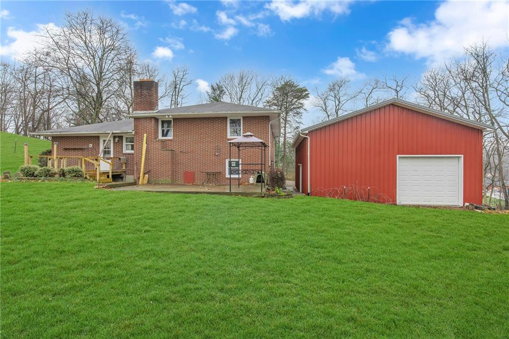 101 2nd Street Midland, PA 15059 - Photo 23 of 37 a front view of house with yard and green space