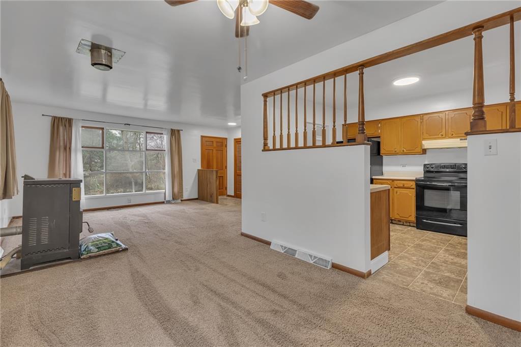 101 2nd Street Midland, PA 15059 - Photo 5 of 37 a view of a kitchen with furniture and a kitchen