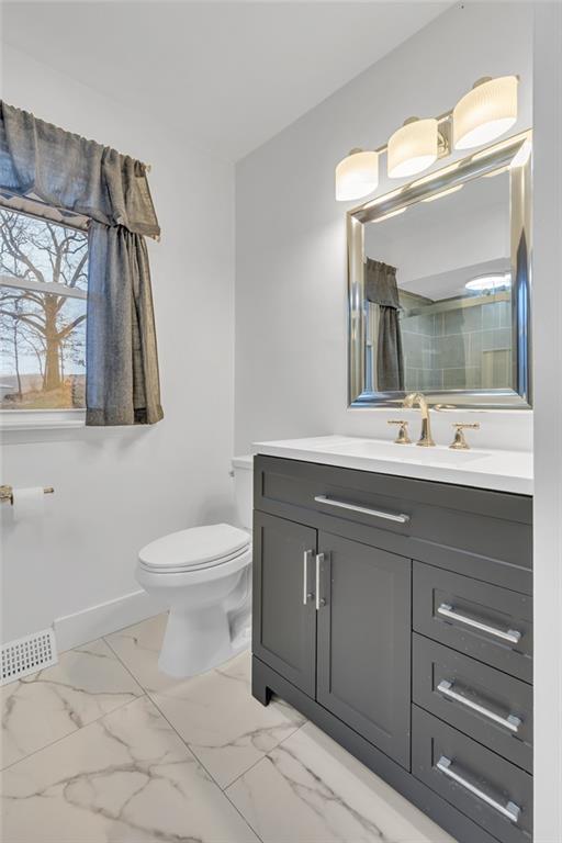 101 2nd Street Midland, PA 15059 - Photo 9 of 37 a bathroom with a sink mirror and toilet