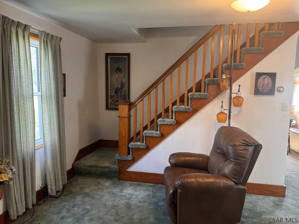 139 Reed Street Elmora, PA 15737 - Photo 13 of 23 a view of entryway and hall with wooden floor