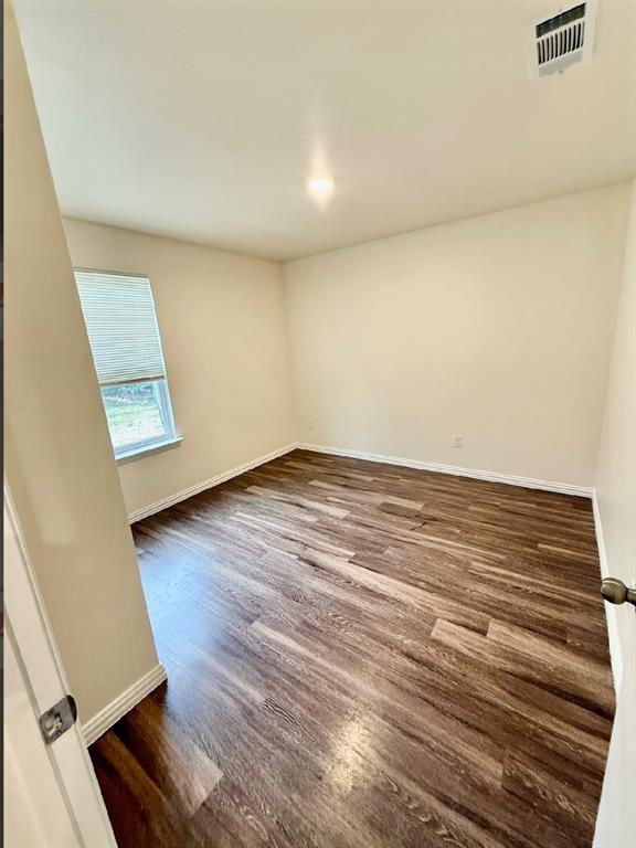 812 South 22nd Street Temple, TX 76501 - Photo 21 of 34 wooden floor in an empty room