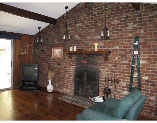 1701 Partridge Run Road Upper St. Clair, PA 15241 - Photo 12 of 18 Den/Family/Great Room. Other features of the family room are the beamed cathedral ceiling and sliding door to the screened porch.