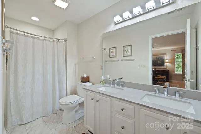 a bed room with a bed and a table