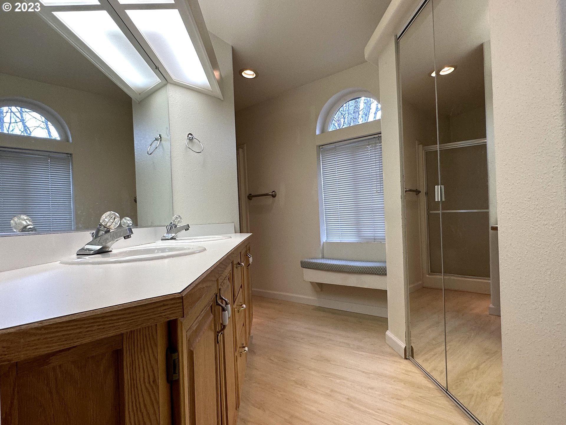 4055 Royal Avenue, Unit 24 Eugene, OR 97402 - Photo 18 of 31 a bathroom with a sink a toilet and a mirror