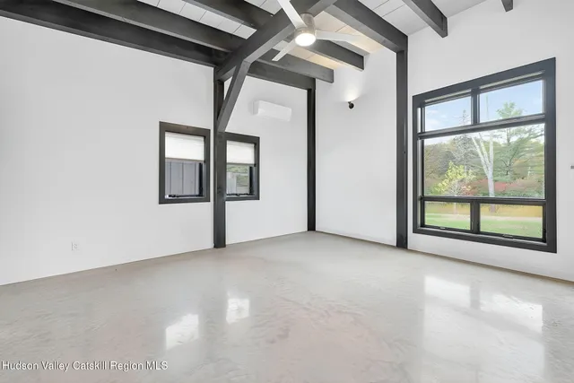 an empty room with windows