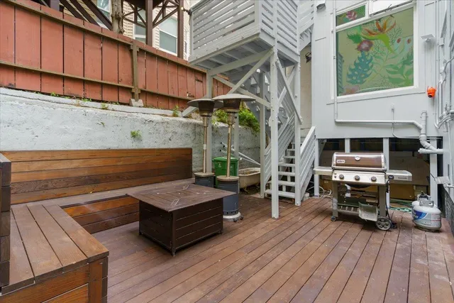 a view of sitting area with furniture and wooden floor