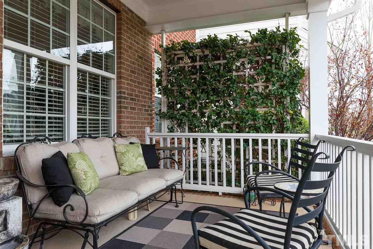 650 Democracy Street Raleigh, NC 27603 - Photo 2 of 25 a balcony with furniture and a window