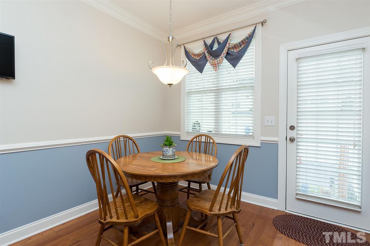650 Democracy Street Raleigh, NC 27603 - Photo 11 of 25 a view of a dining room with furniture and window