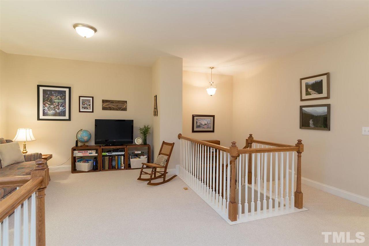 650 Democracy Street Raleigh, NC 27603 - Photo 18 of 25 a view of a livingroom with furniture and windows