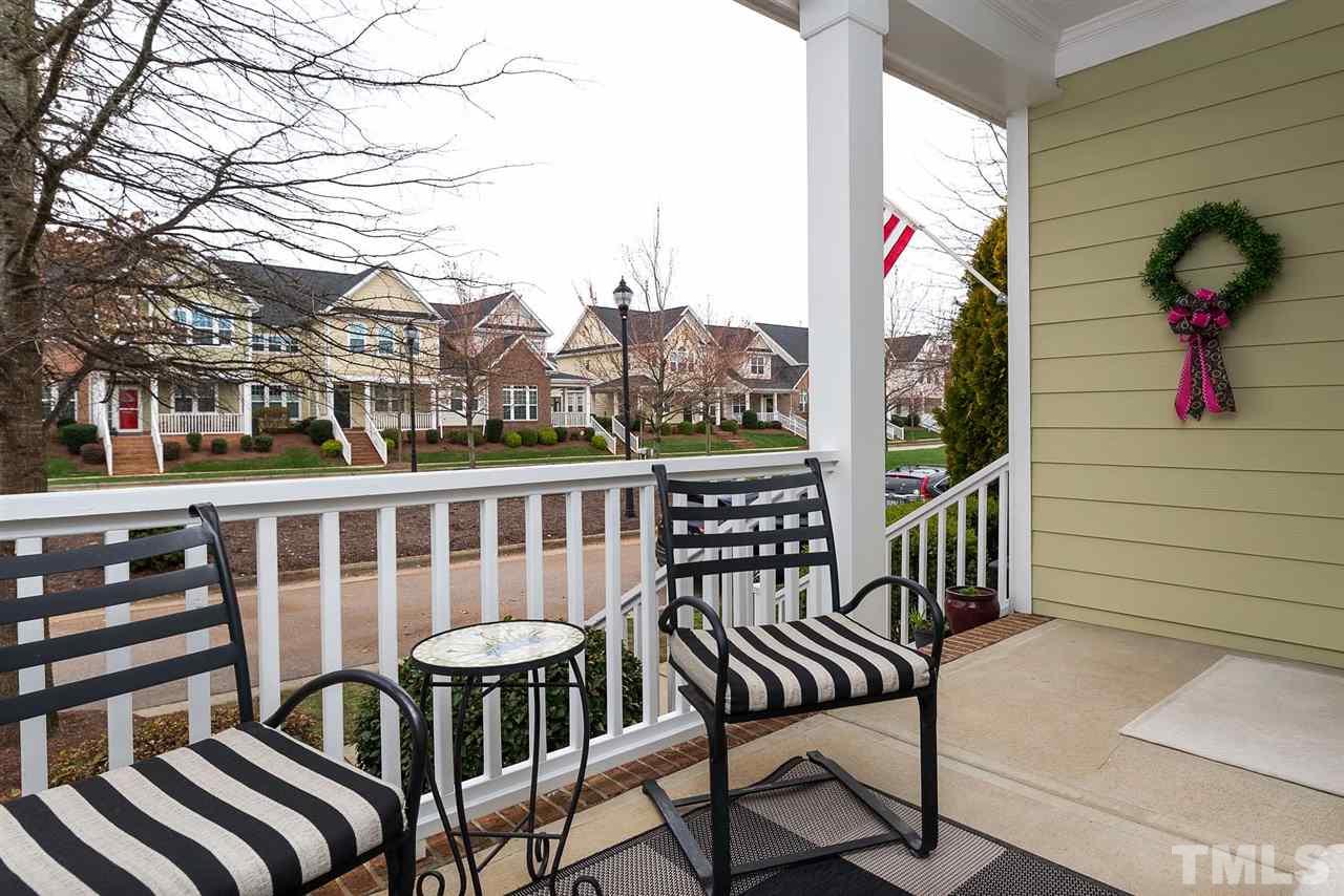 650 Democracy Street Raleigh, NC 27603 - Photo 3 of 25 a view of a chairs and tables in the balcony