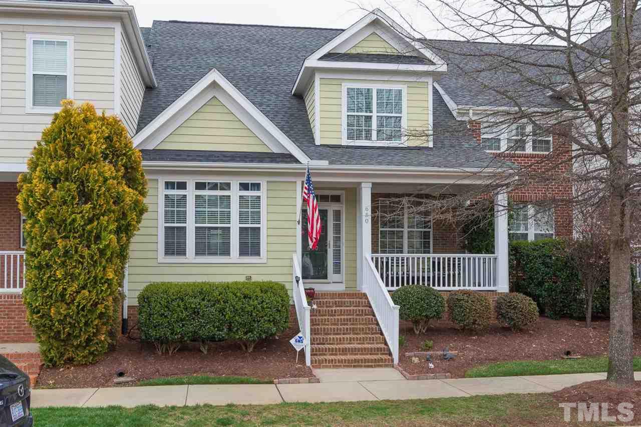 650 Democracy Street Raleigh, NC 27603 - Photo 24 of 25 front view of a house with a yard
