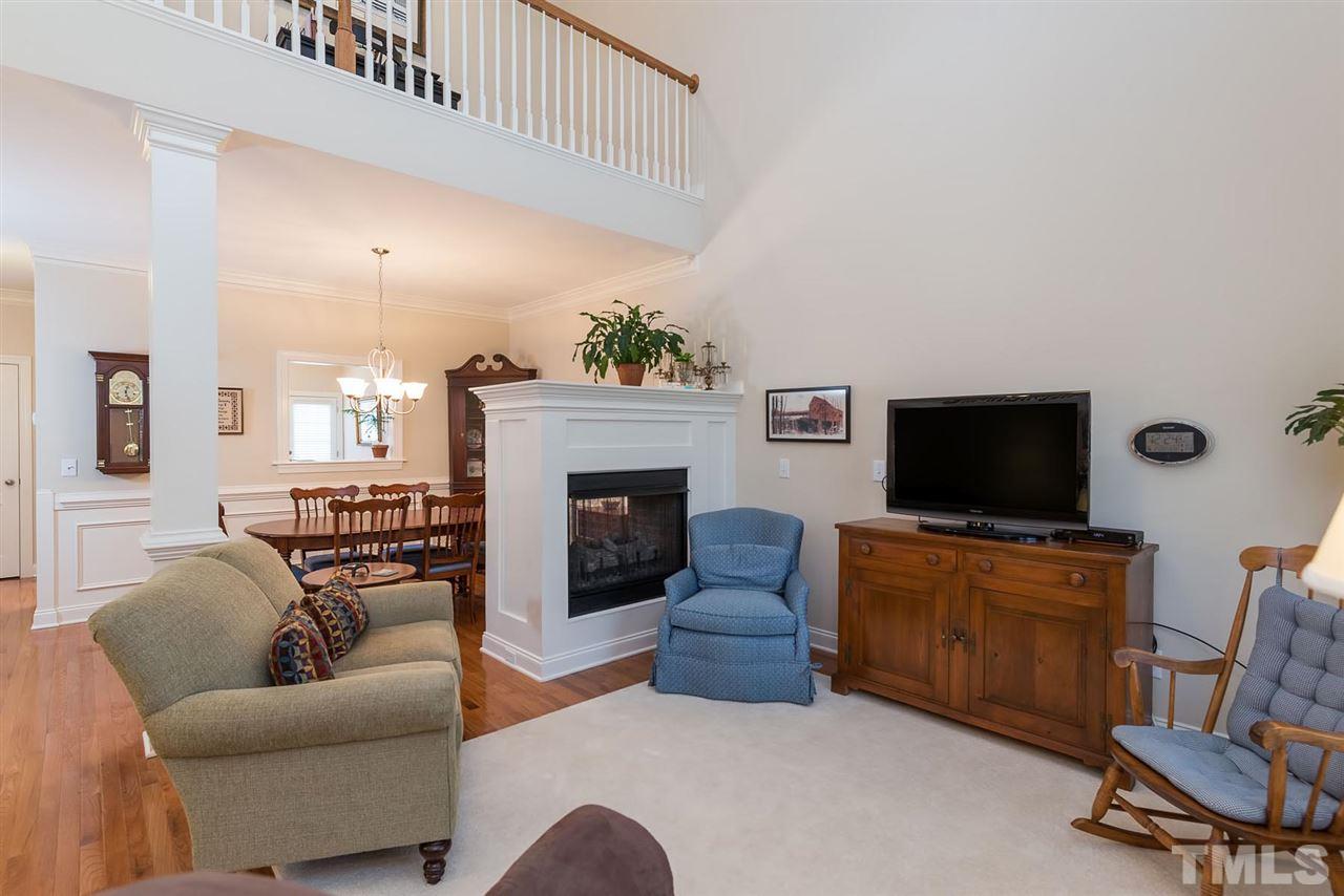 650 Democracy Street Raleigh, NC 27603 - Photo 4 of 25 a living room with furniture and a flat screen tv