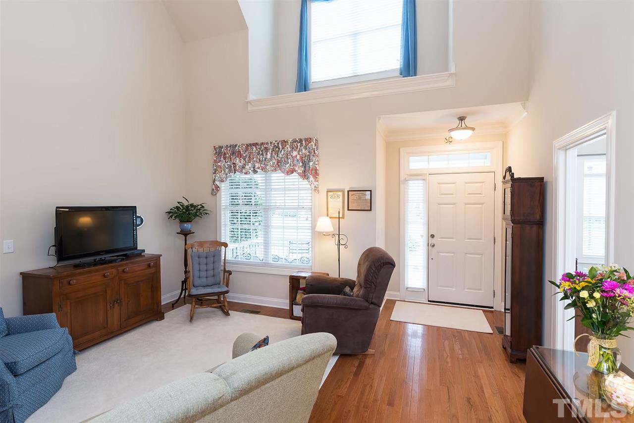 650 Democracy Street Raleigh, NC 27603 - Photo 5 of 25 a living room with furniture and a flat screen tv