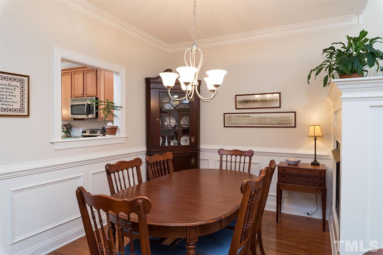 650 Democracy Street Raleigh, NC 27603 - Photo 7 of 25 a view of a dining room with furniture window and wooden floor